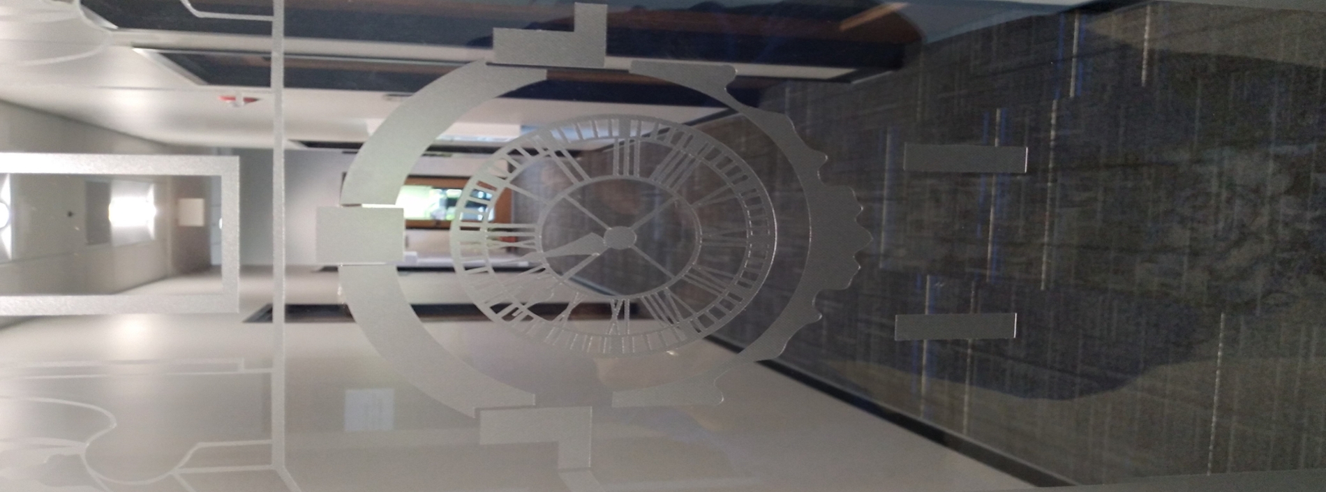 abstract of clocktower from glass frosted door