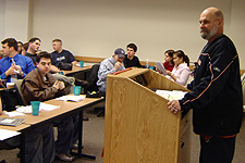 Photo: Mike Bernacchi, professor of Business Administration, discusses this year's Super Bowl advertisements with students at his annual "Super Bowl Ad Nauseam."