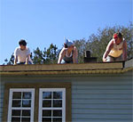 Students repairing roof