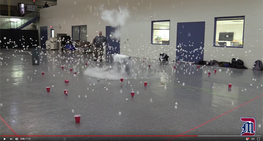 Screeshot from the Liquid Nitrogen Ping Pong event. Red cups are lined up and ping pong balls fly everywhere.