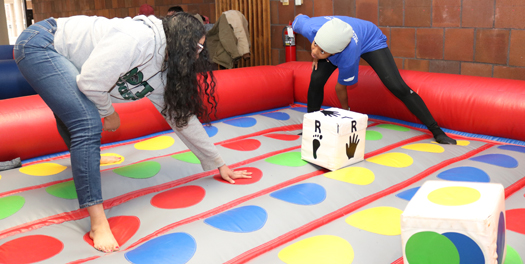 Detroit Mercy students playing inflatable Twister