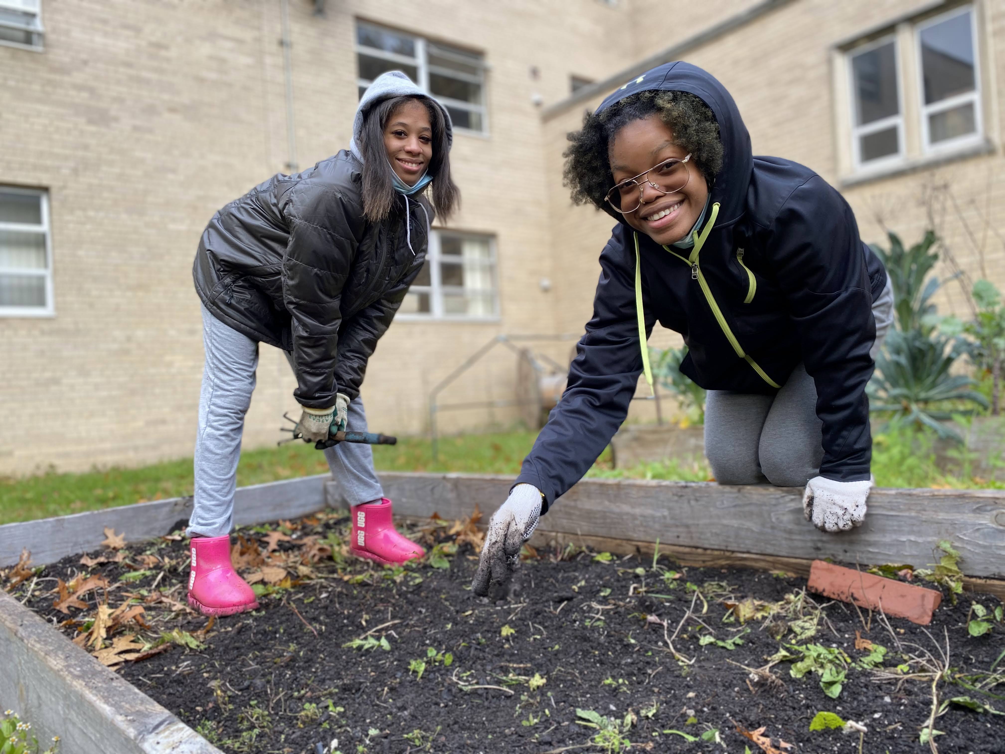 Picture of students in the garden