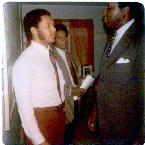 Detroit Mercy president Antoine Garibaldi is shown with his friend Vernon Jordan.