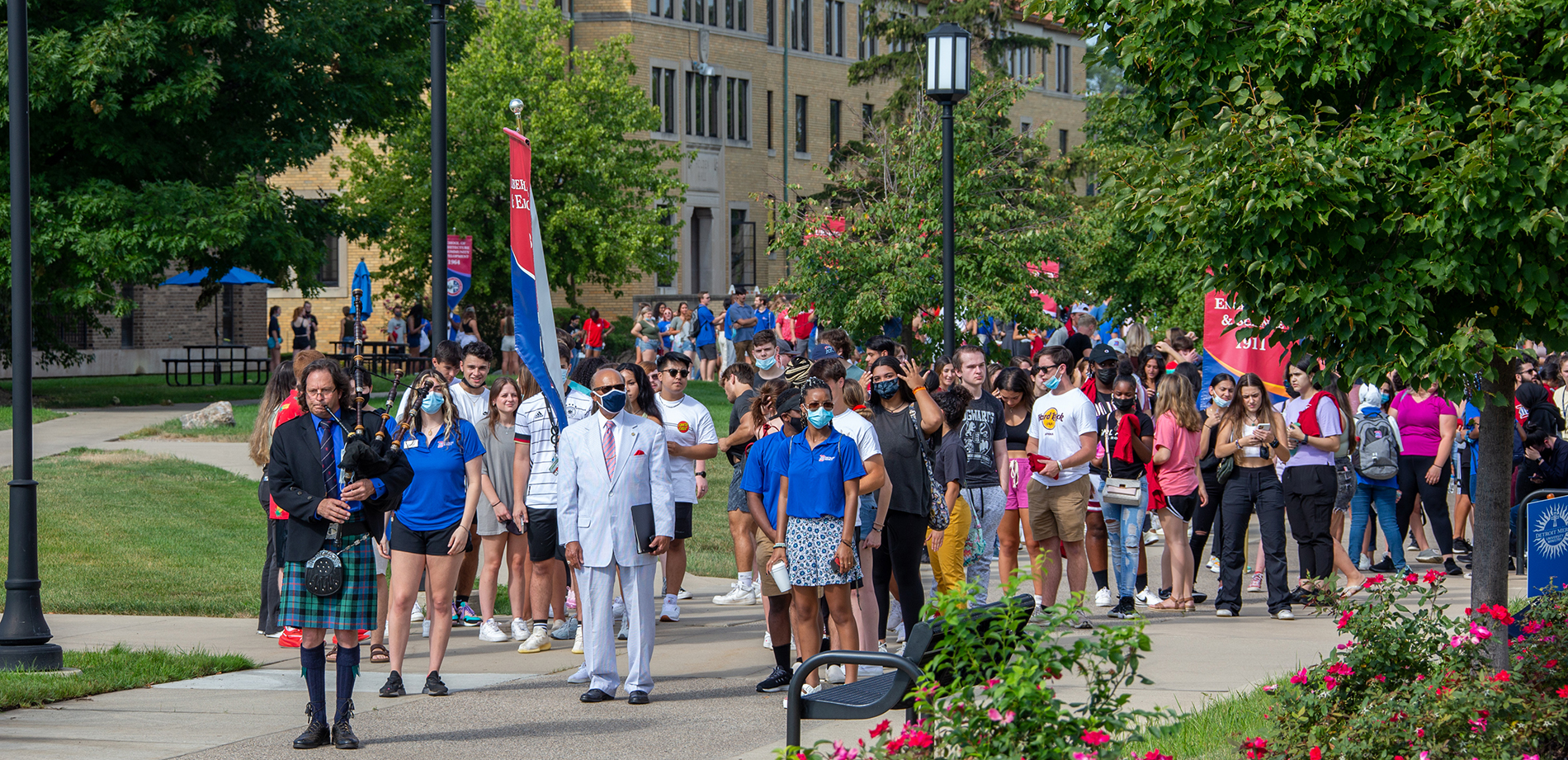 President Antoine M. Garibaldi and new students line up to start first-year convocation.