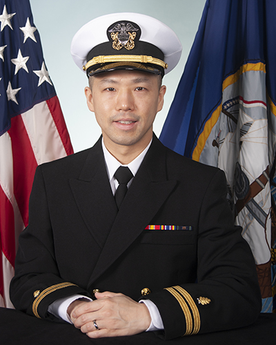 A portrait photograph of Daniel Nho during his time in the U.S. Navy.