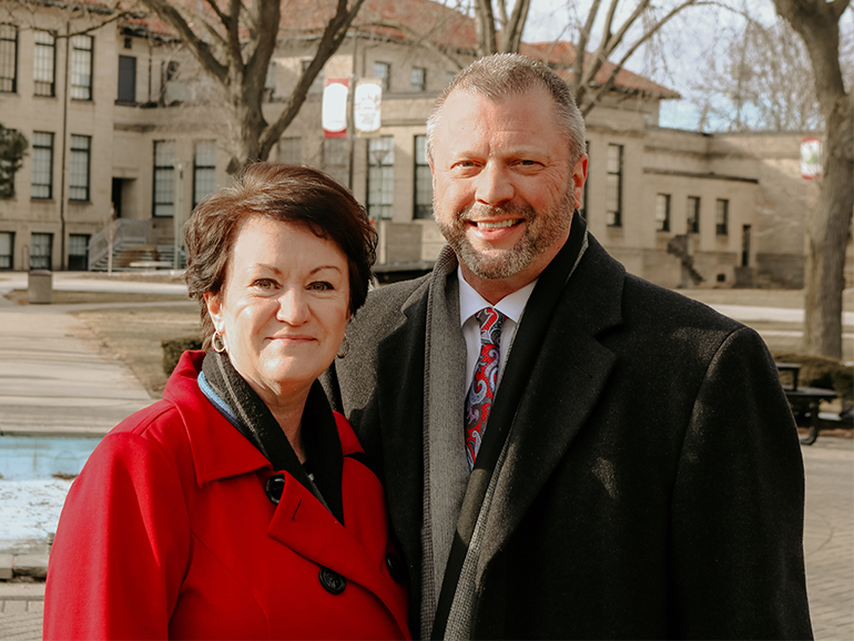 Donald Taylor, left, and wife, Lechia, outdoors on the McNichols Campus.