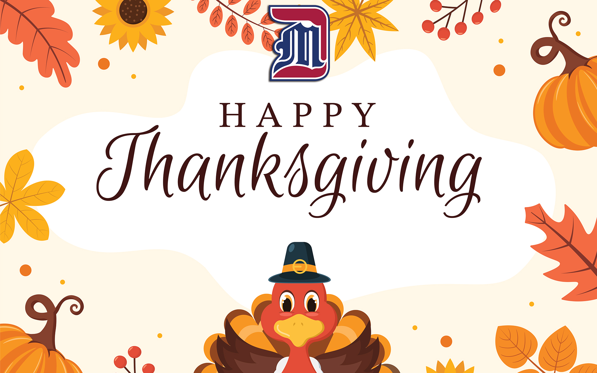 A Happy Thanksgiving graphic with a cartoon turkey on it, as well as the University of Detroit Mercy logo at the top.