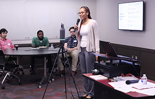 Courtney Christian speaks at an event.