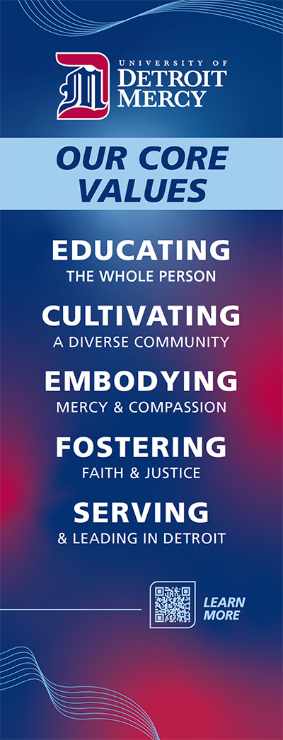 a banner featuring UDM's new core values: educating the whole person, cultivating a diverse community, embodying mercy and compassion, fostering faith and justice, serving and leading in detroit.