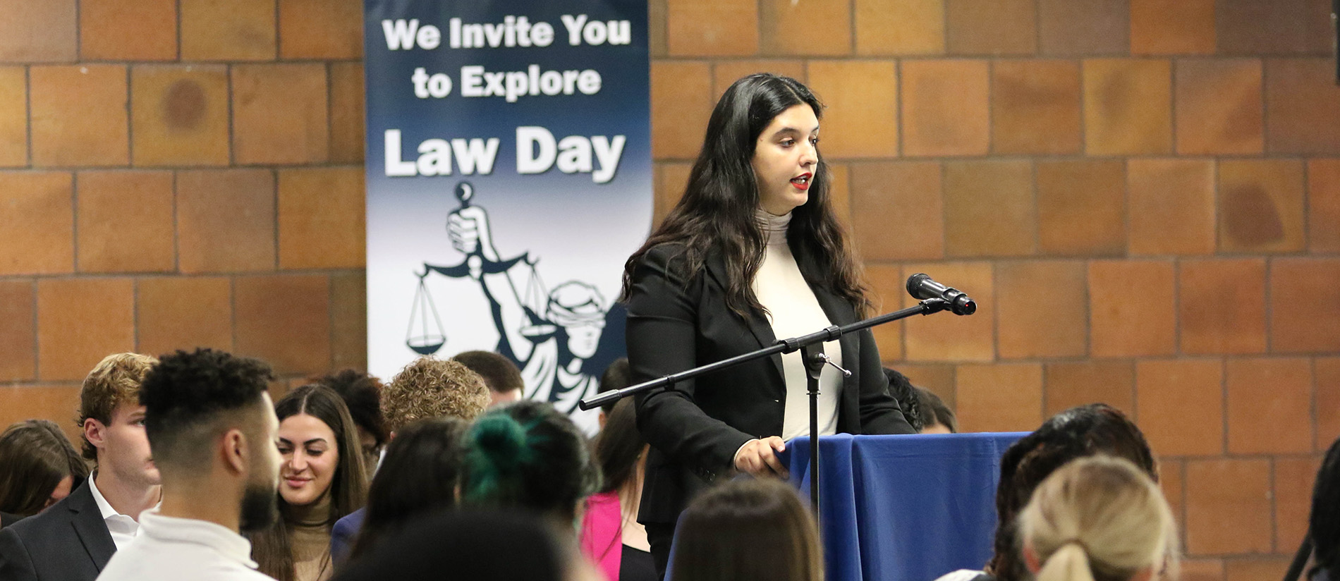 Cristal Guzman speaks at law day.