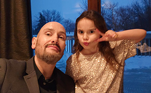 Steven Meerschaert poses for a photo with his daughter.