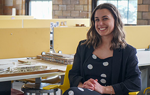 A photograph of Finley Booth in UDM's architecture studio.