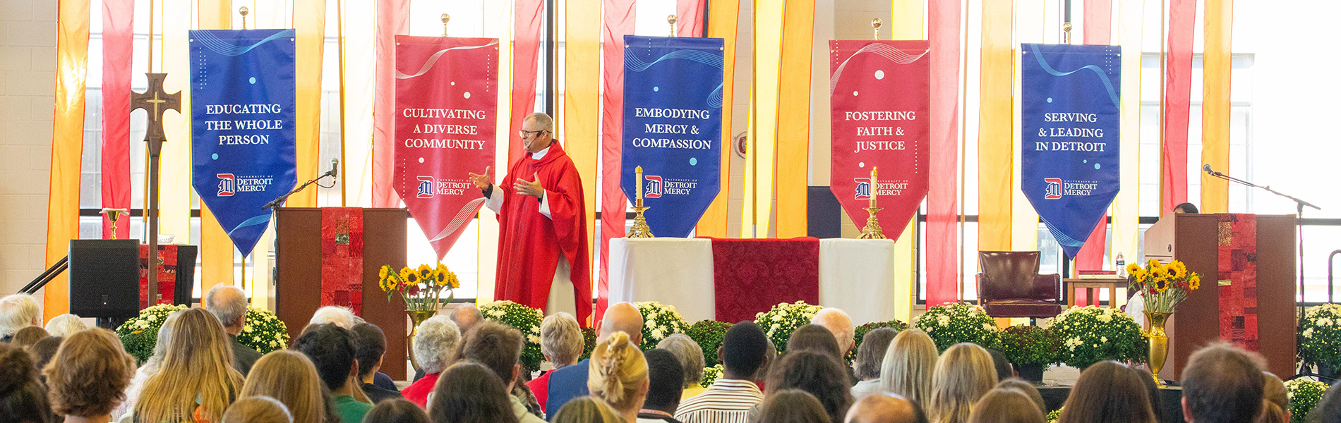 A priest presides over Celebrate Spirit Mass.
