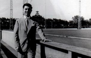 Don Yick Chin stands next to Titan Field in the 1950s.