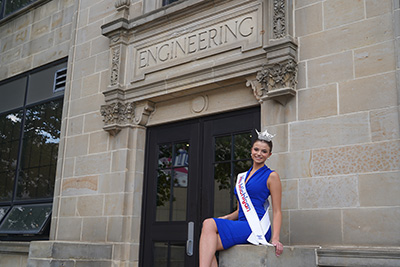 Grace Hanke poses for a photo outside the Engineering Building.