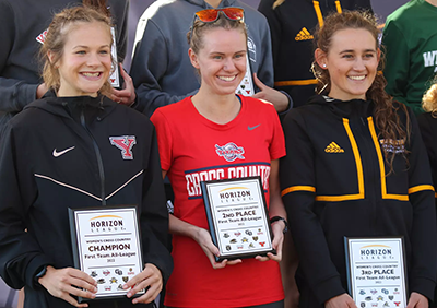 Allison Sherman holds her runner-up award at the Horizon League Championships while competing for the Titans.