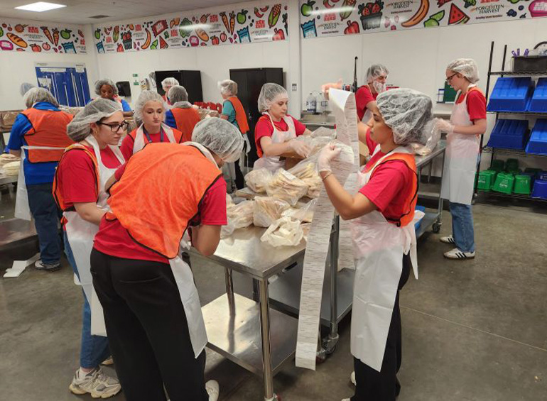 Law students volunteer in the community as part of their orientation.