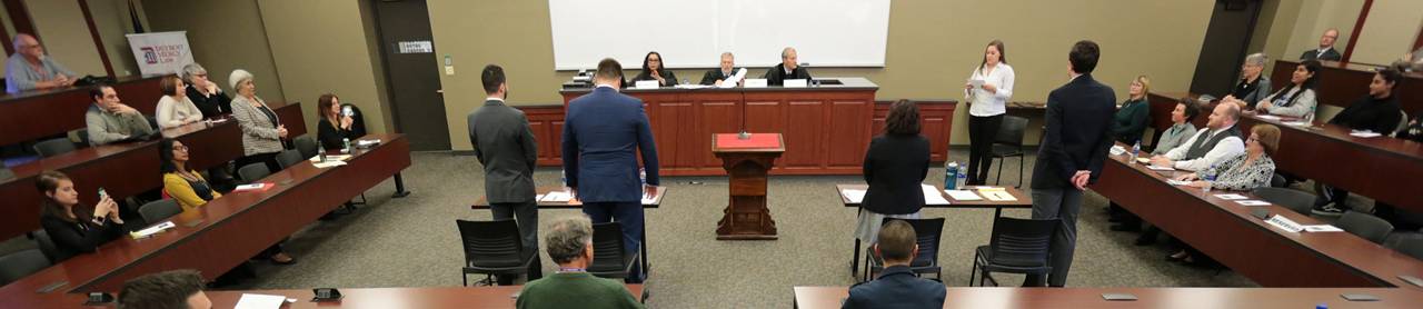 Law competition - students in a moot court setting