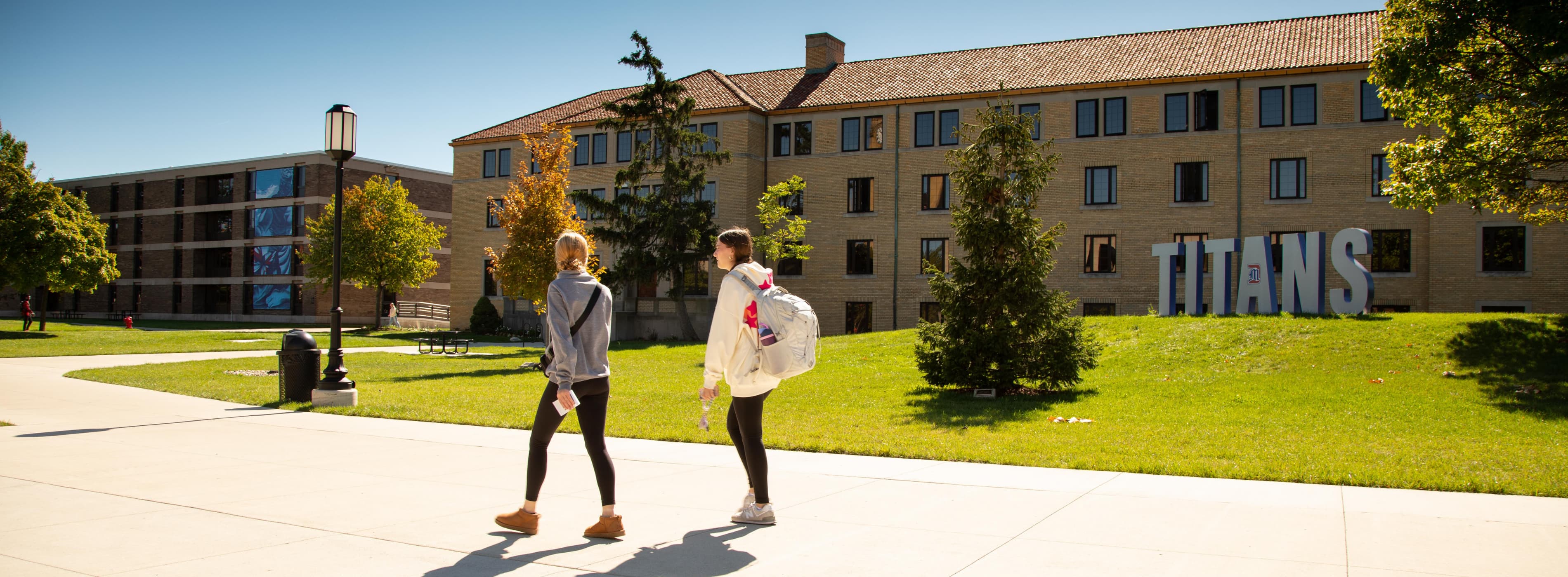 Students walk on the Kassab Mall.