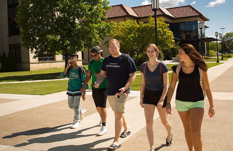 Students walking by Engineering building