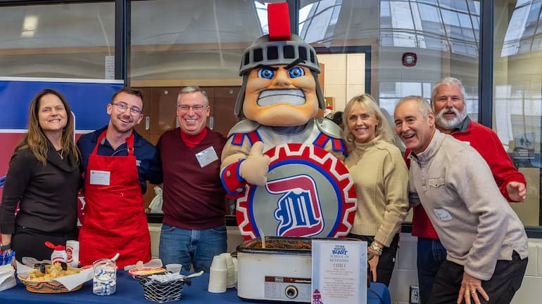 Students, alumni and staff at chili cookoff during Winter Blast 2025