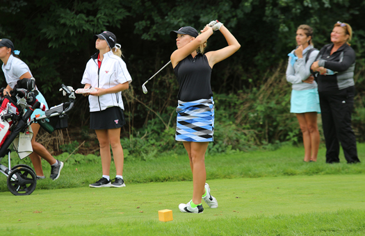 Thompson golfing