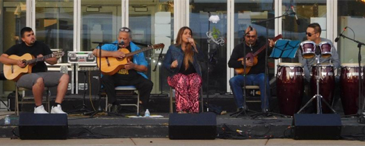 The band, Comparsa Sur featuring Bandolero Duran, is a group of musicians from several Latin America countries coming together to perform songs from across the region