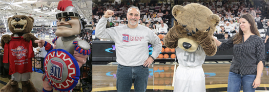A defeated Oakland University mascot Grizz holds up the Titan red shirt next to Detroit Mercy Titans mascot Tommy Titan. Detroit Mercy beats Oakland University at 2018 donor challenge