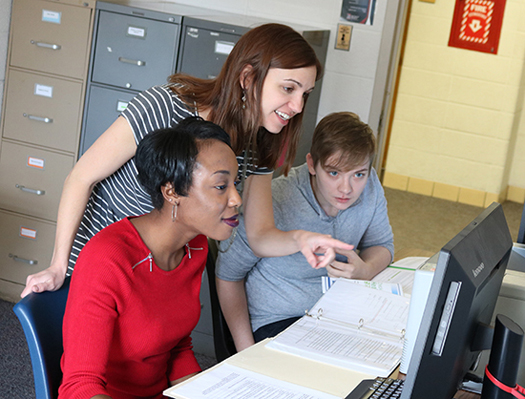 Associate Professor of Psychology Kristen Abraham and students