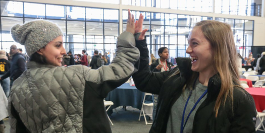 Two future Titans high five at Accepted Students Day