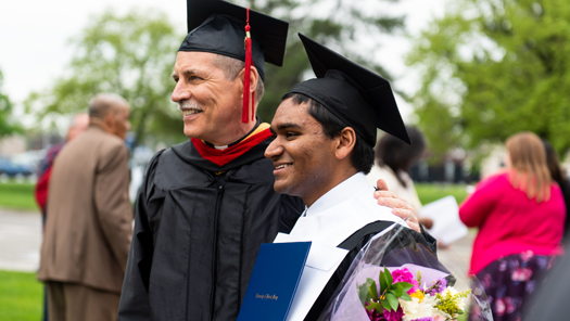 Fr. Tim with 2018 graduate