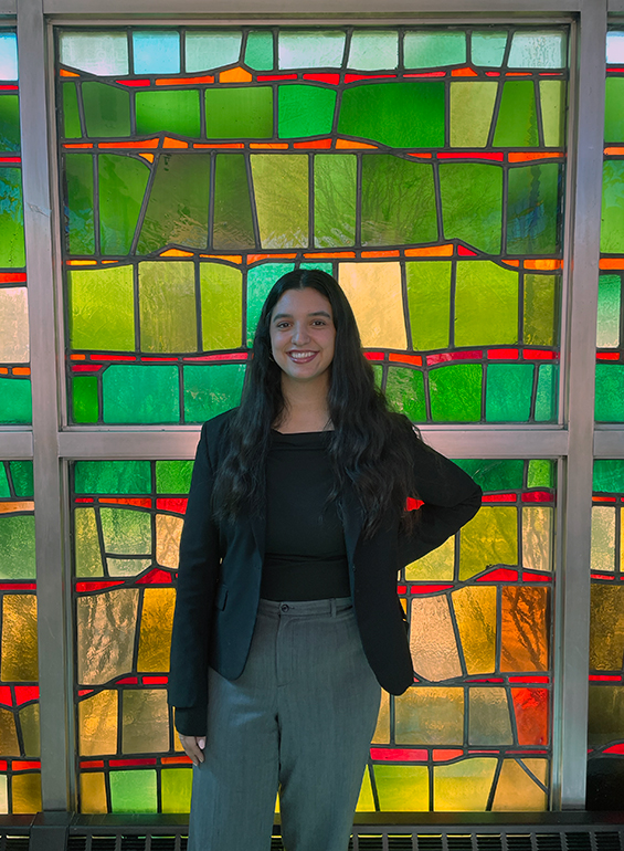 A photo of Cristal Guzman inside the Gardella Honors House.
