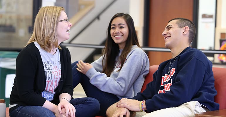 3 students laughing