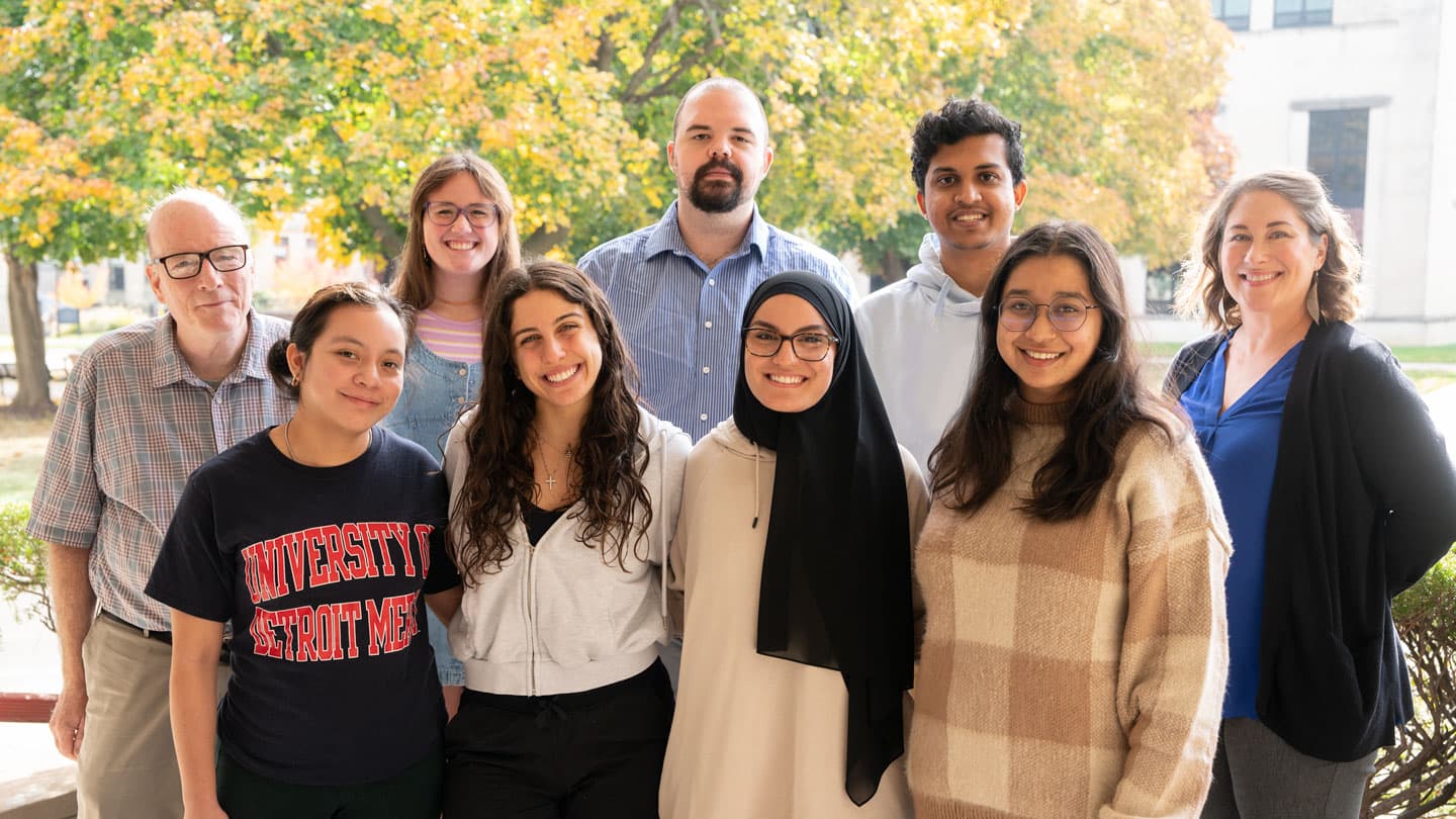 Group shot of faculty and students on McNichols Campus