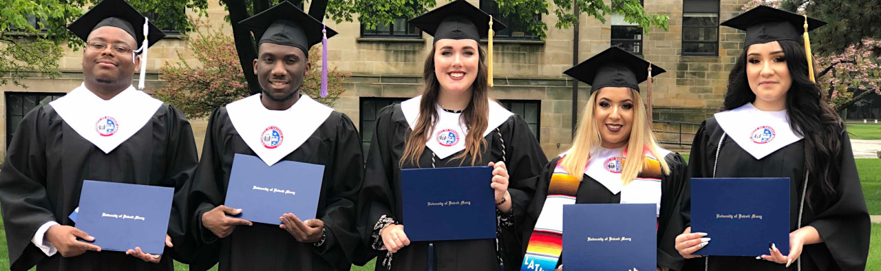 grads from UDM