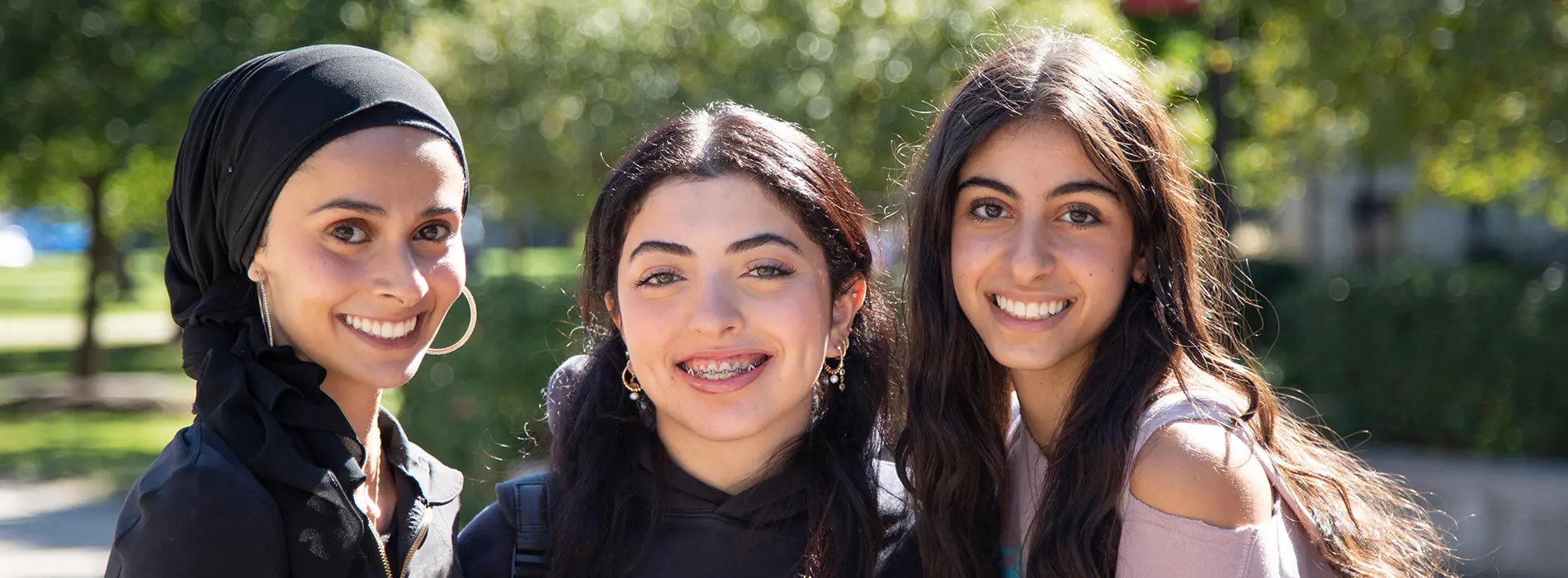 students smiling at camera