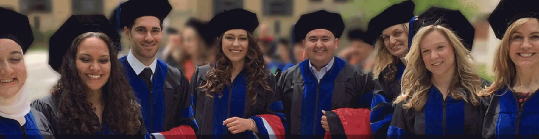 group of smiling psychology grads
