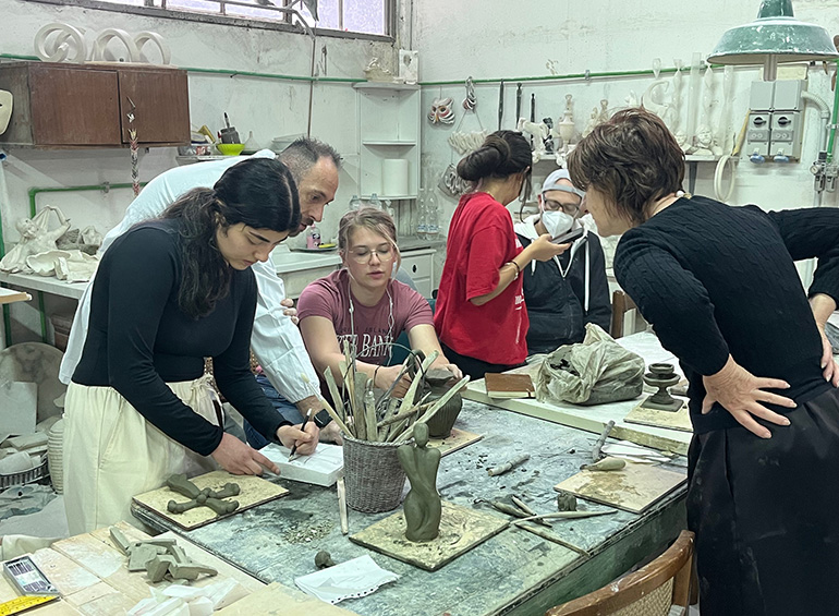 students working with ancient remains