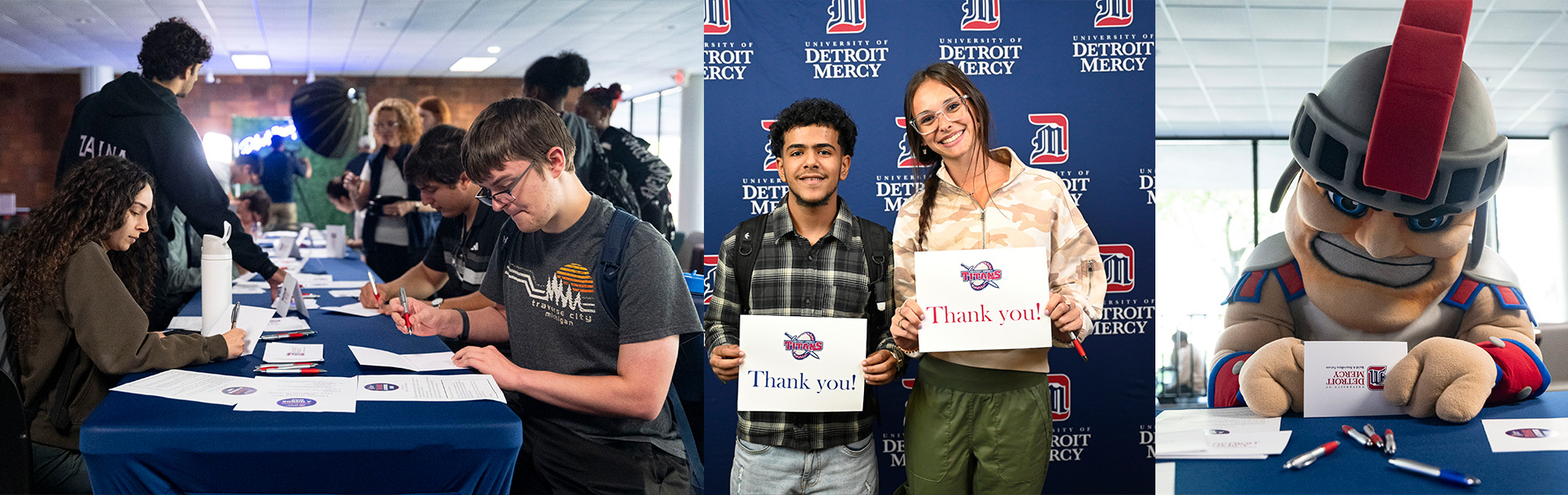 Students and Tommy Titan sign cards thanking donors, while two students hold a sign up that say thank you with the UDM athletics logo.