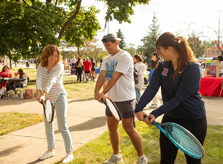 students practicing badmitton