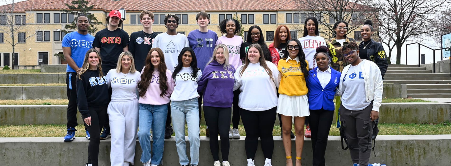 students with Greek letters