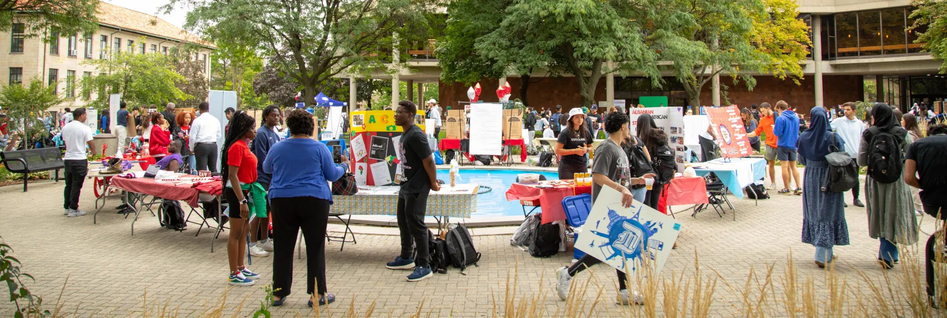 Students organization fair around the Fisher Fountain