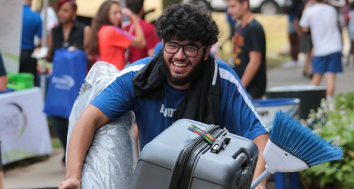 A student moves into a residence hall.