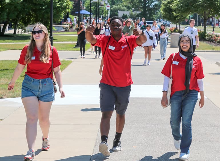 students walking from campus class tours