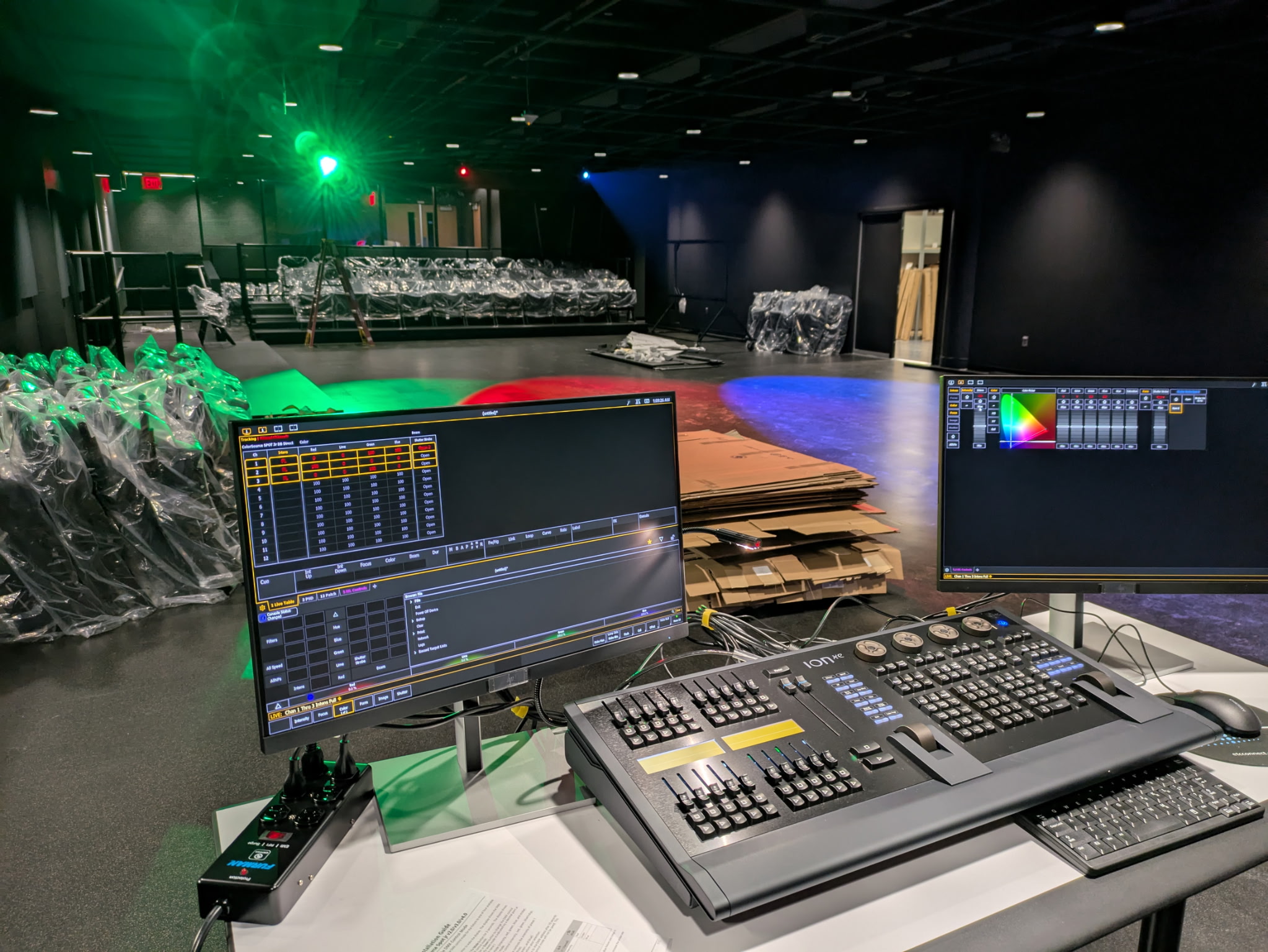Inside the theatre with light board and chairs