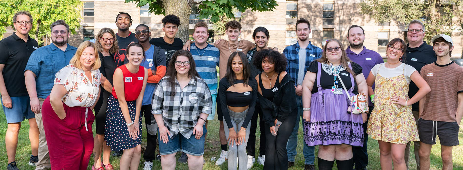 Theatre students group shot outside of Reno Hall during the 2022 reception party